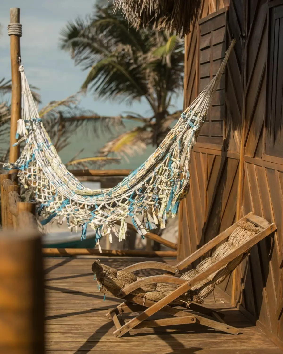 Hammock në verandë në vilë: Foto