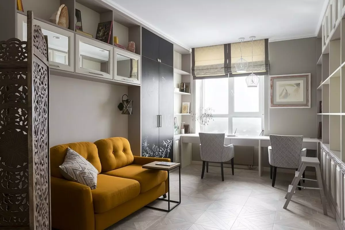 Interiorul unui apartament cu pictura artistică a pereților, șemineu cu abur și ergonomie atent 4818_9