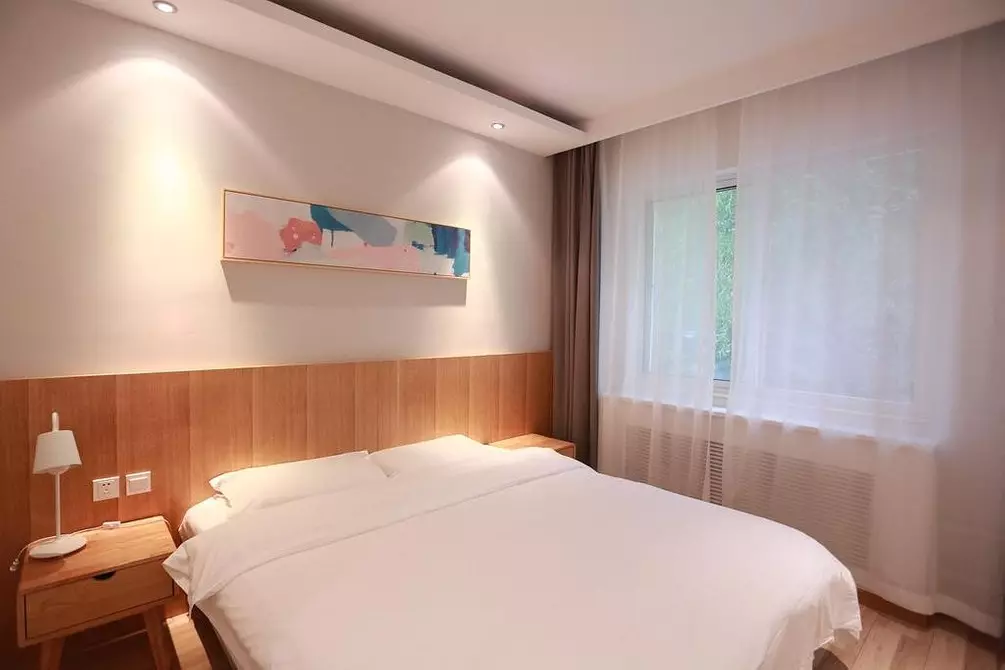 चीन के होटलों से 5 विचार जिन्हें आप एक छोटे से अपार्टमेंट के लिए आवेदन कर सकते हैं 5366_10