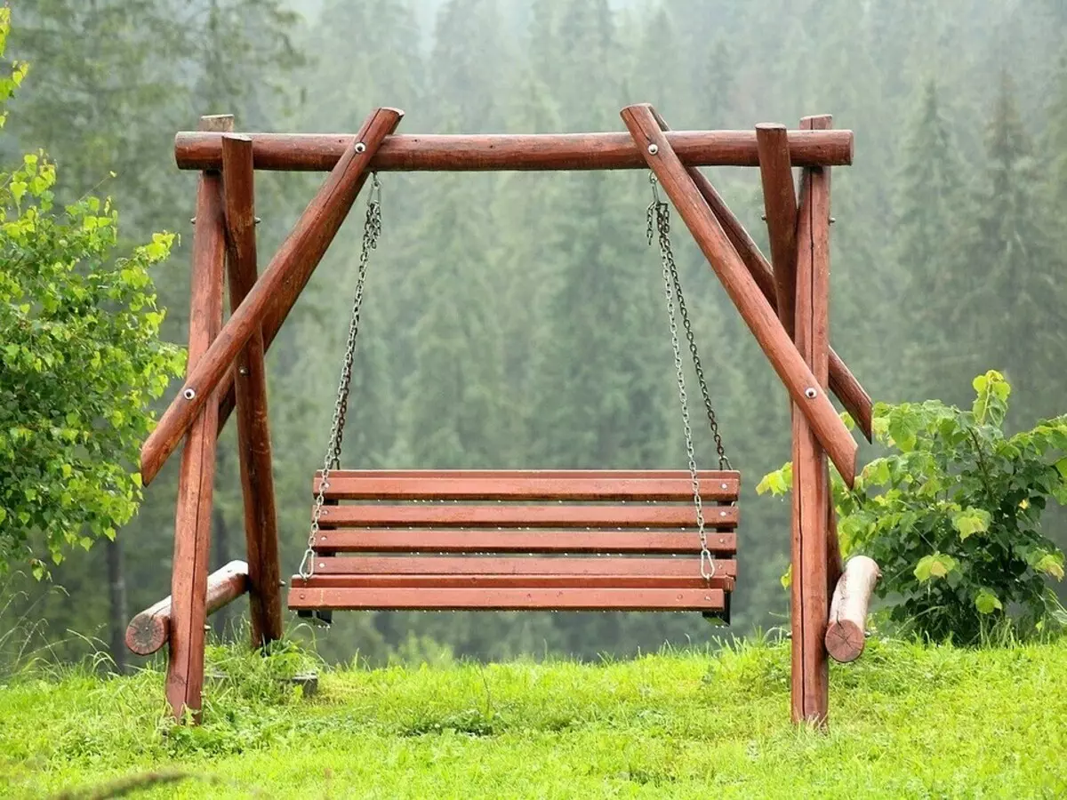 Kami membuat berayun taman dari kayu dengan tangan mereka sendiri: kelas master yang dapat dimengerti 5528_6