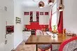 How to issue a design of red-white kitchen: current tips and antiprodes