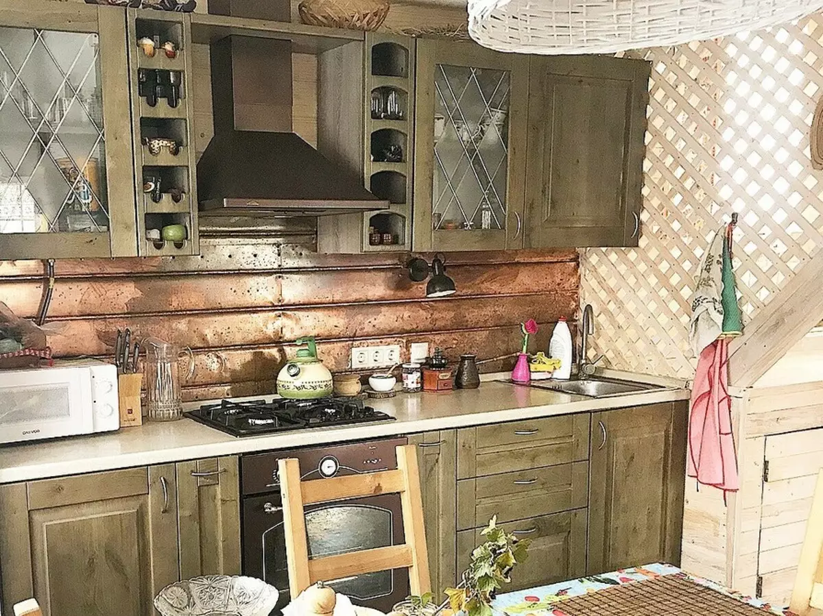 Come emettere un interno della cucina presso il cottage: soluzioni stilistiche e 45+ photoy 9012_10