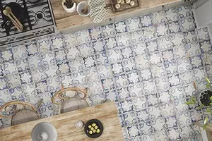 Lati awọn nunaces imọ-ẹrọ si grout ti o yẹ: tile lati yan ni ibi idana si ilẹ 9127_1