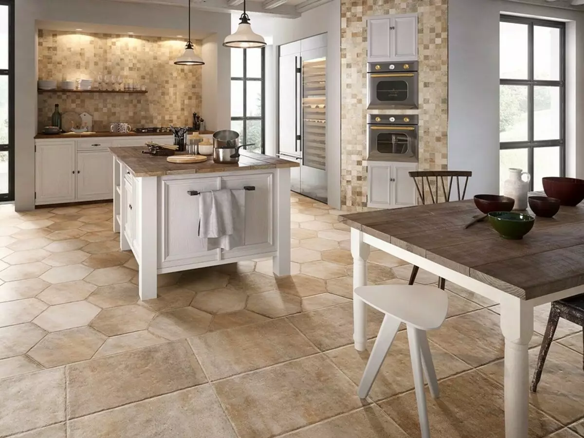 Lati awọn nunaces imọ-ẹrọ si grout ti o yẹ: tile lati yan ni ibi idana si ilẹ 9127_52