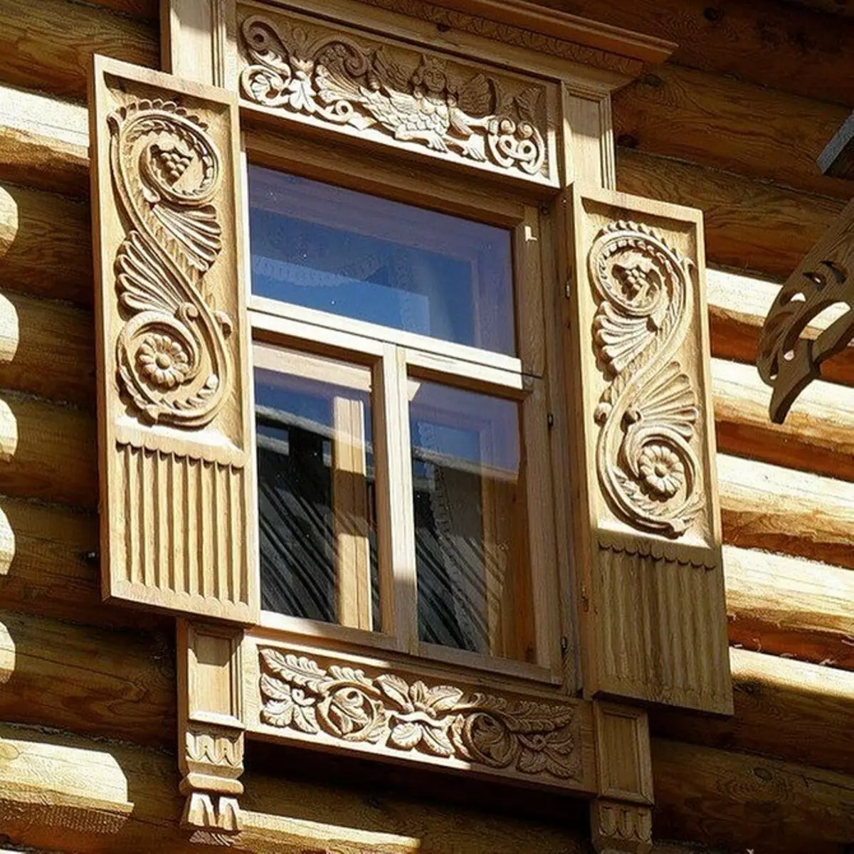 Platbands tallados en las ventanas en una casa de madera: Maternitym e Install hágalo usted mismo 9481_63