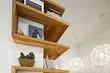At the head of the corner: 9 best ideas for angular shelves
